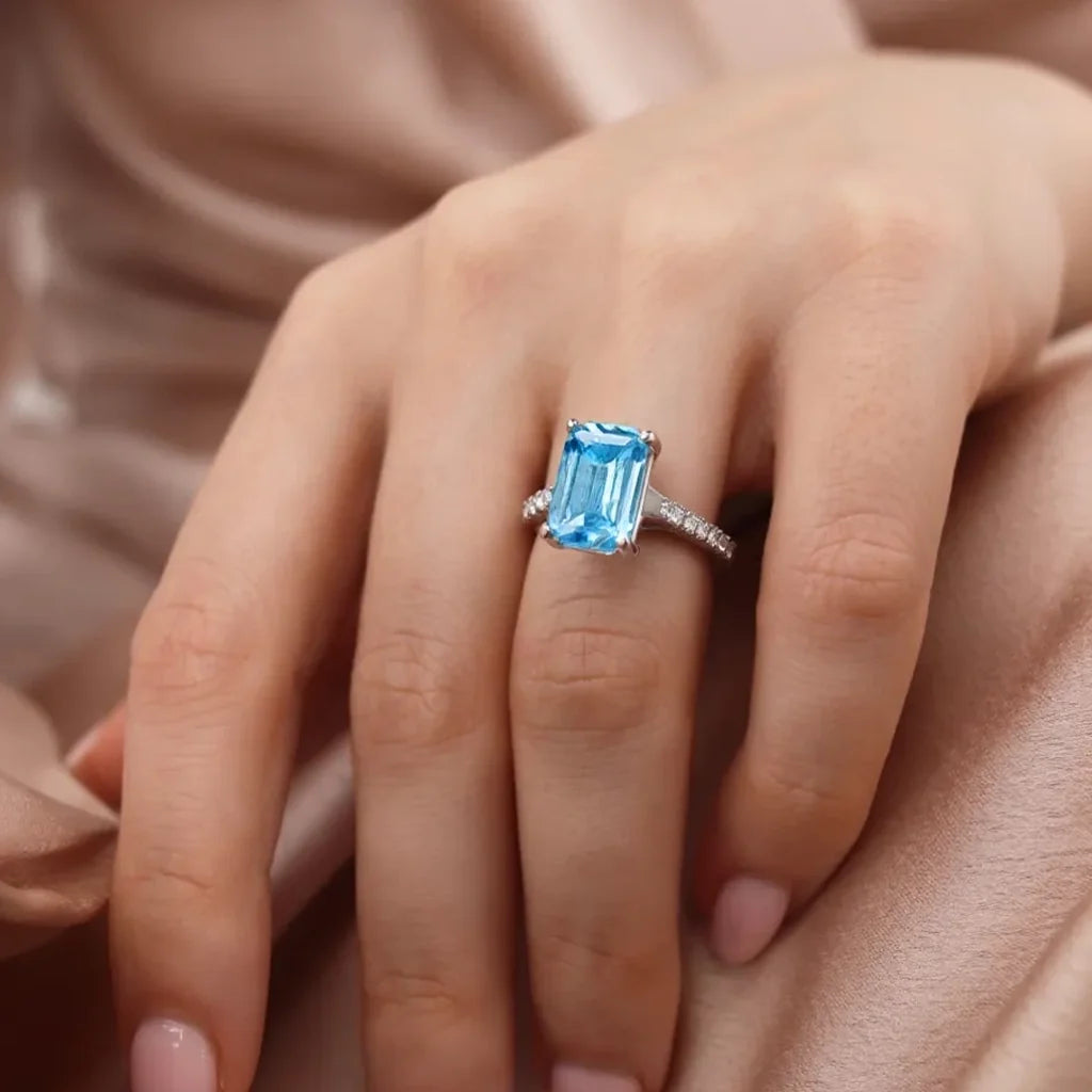 Marina’s Evermore | 5CT Emerald Cut Sapphire Solitaire Engagement Ring