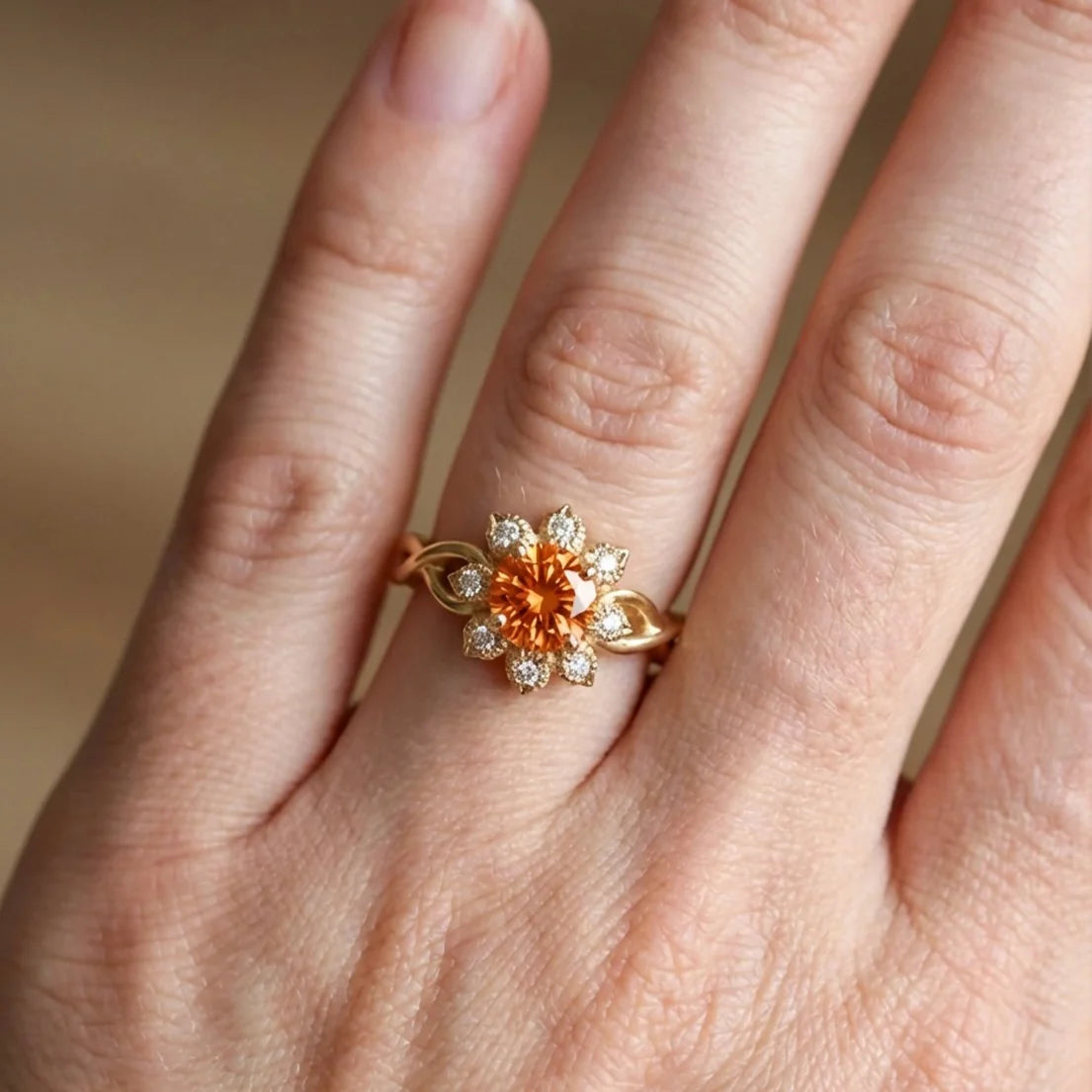 Ivy’s Corolla | Round Orange Garnet Engagement Ring with Petal Halo