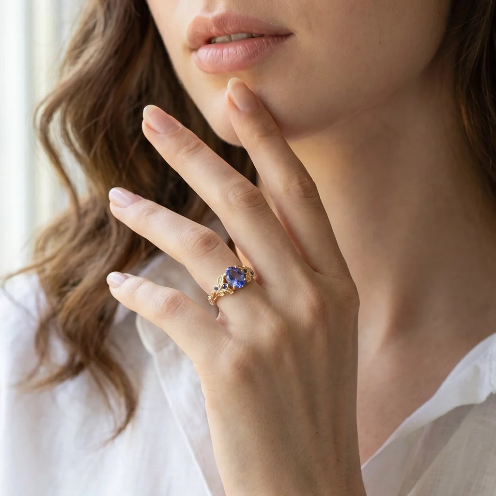 Aria‘s Glade | Oval Cut Tanzanite & Blue Sapphire Leaf Engagement Ring