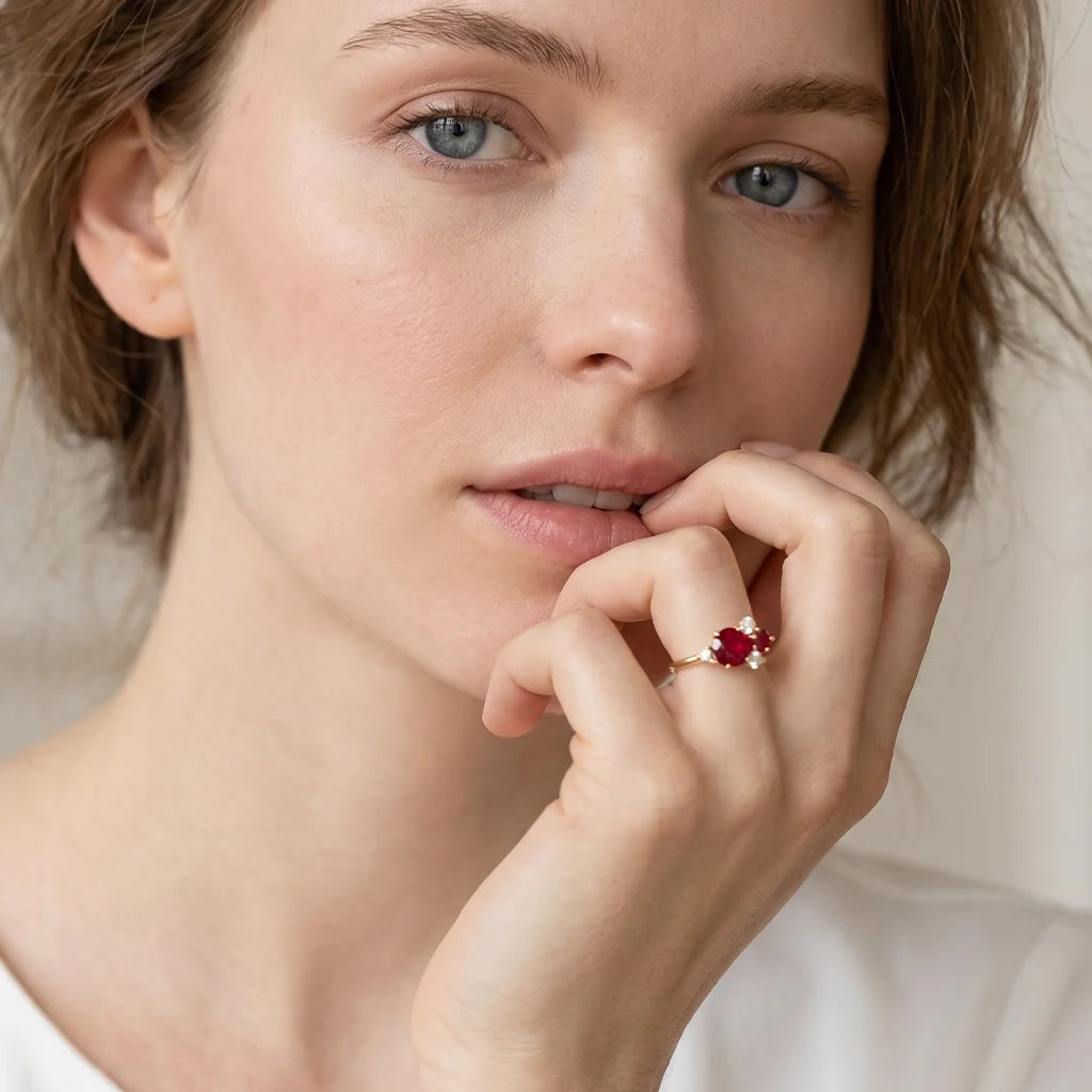Rosalind’s Rose | Round Ruby Engagement Ring with Drifting Diamond Petal Halo