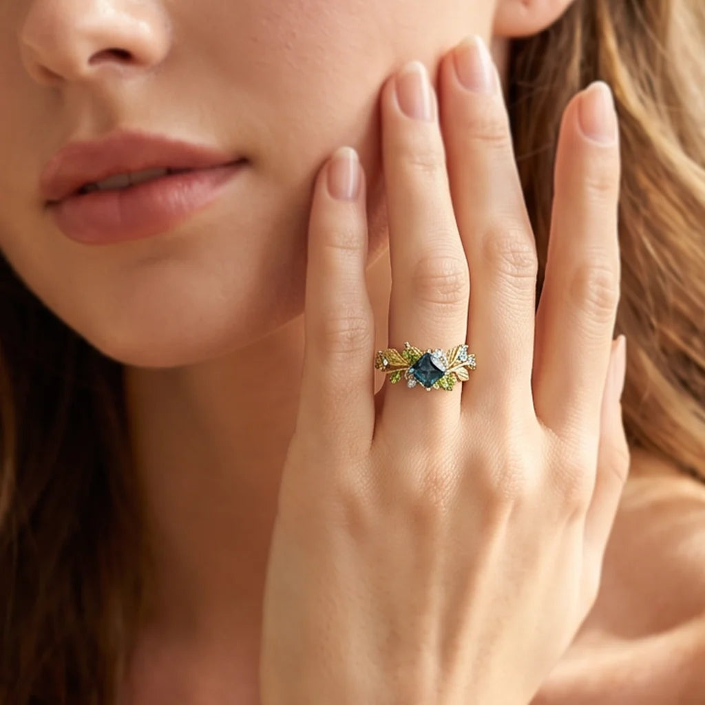 Elowen’s Gildedfrond | Princess Cut London Blue Topaz Leafy Engagement Ring