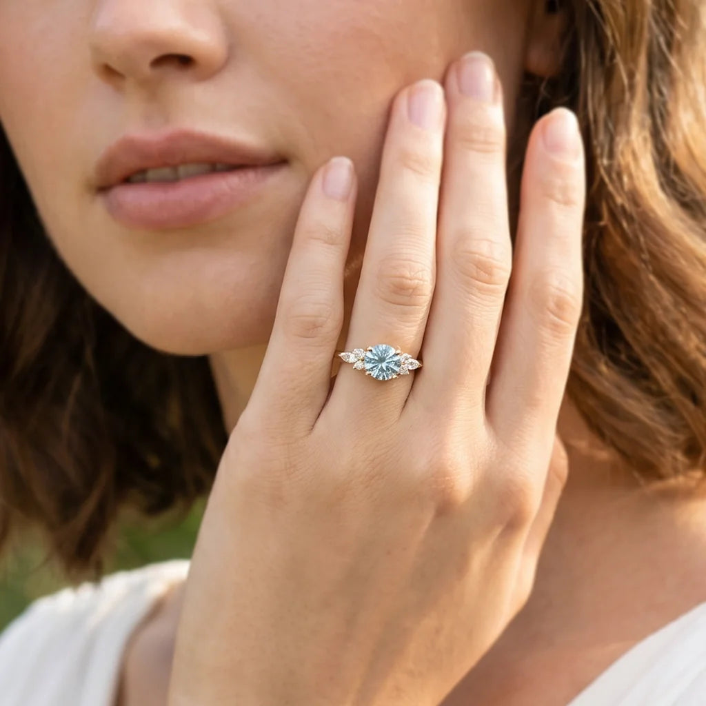 Selene’s Whisper | 1CT Round Cut Blue Sapphire Cluster Engagement Ring