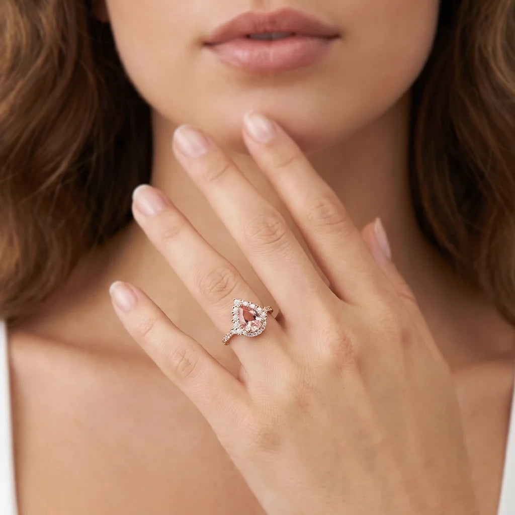 Aurora’s Promise | Pear Cut Pink Sapphire Halo Engagement Ring