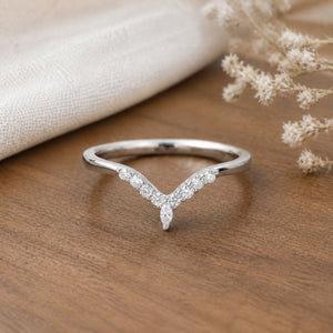 Cressida's Companion Moss Agate and Sapphire Engagement Ring Set on warm walnut tabletop