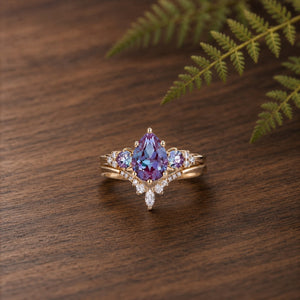 Fern Pear Shaped Alexandrite Cluster Gold Ring Set 2pcs on warm walnut