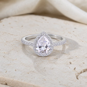 Eternal Elegance Oval-Cut Silver Moissanite Ring — limestone supported front view