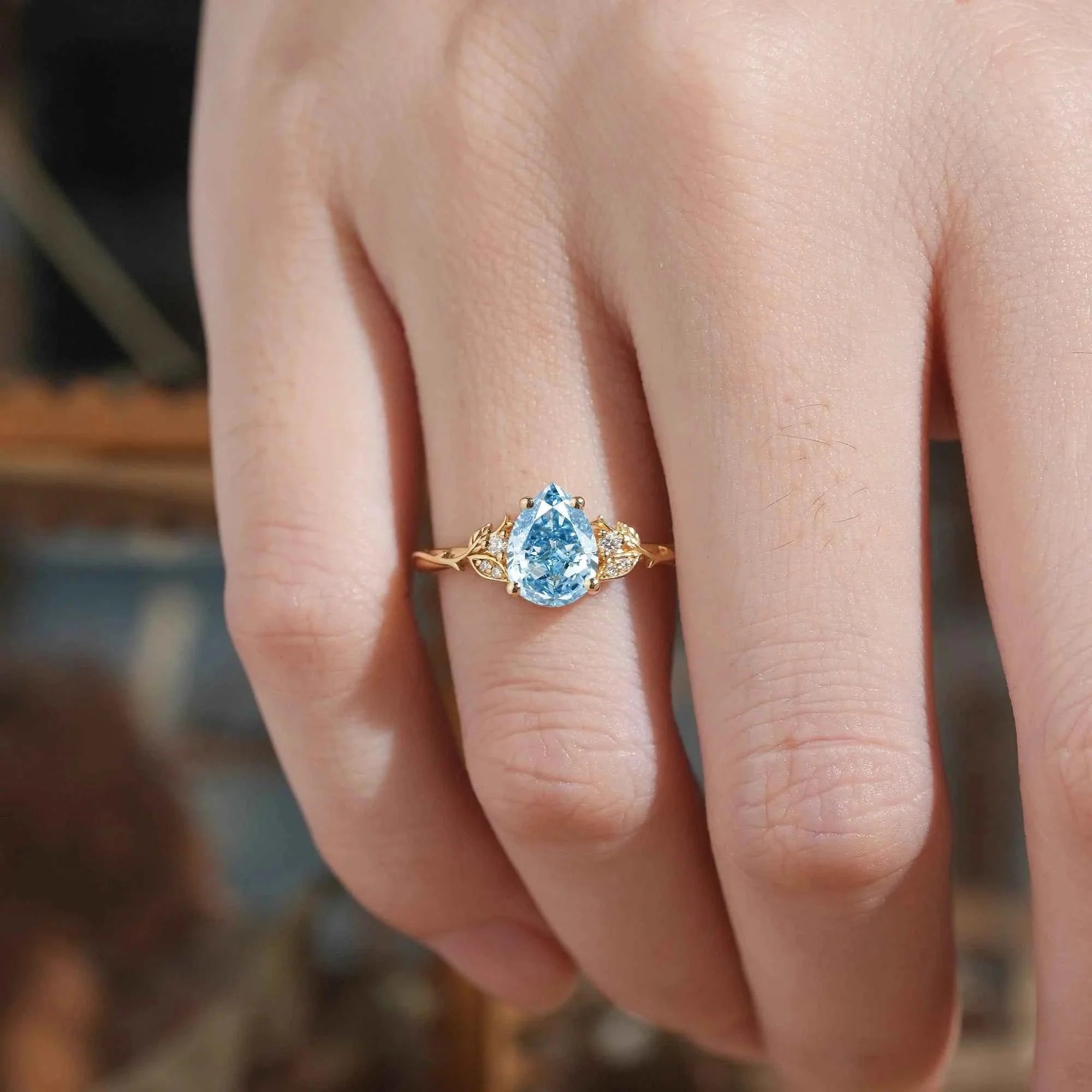 Pear Cut Lab Grown Blue Moissanite Leaf And Vine Inspired Engagement Ring - Kiara | Nartya