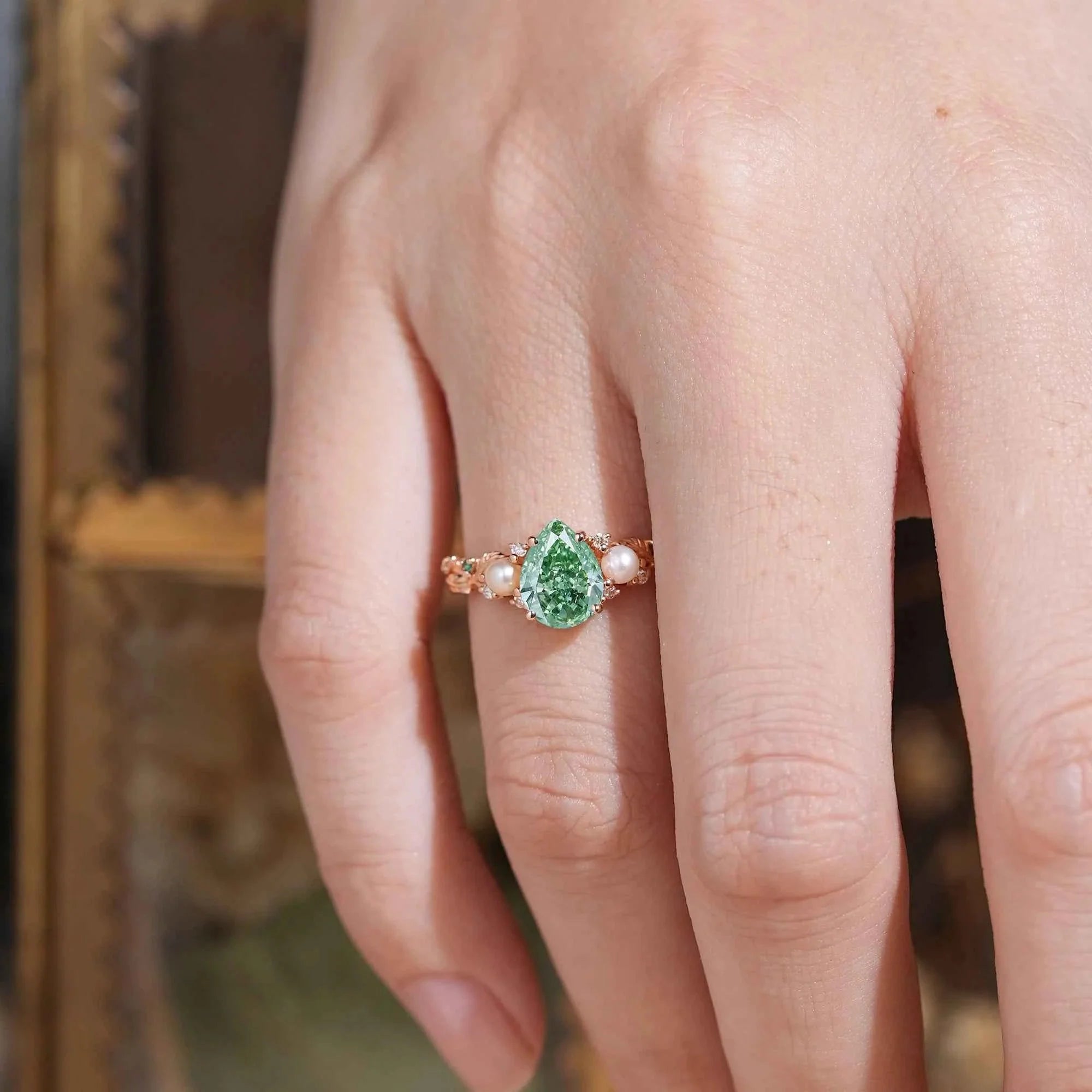 Pear Cut Lab Grown Green Moissanite And Pearl Leaf Engagement Ring - Addison | Nartya