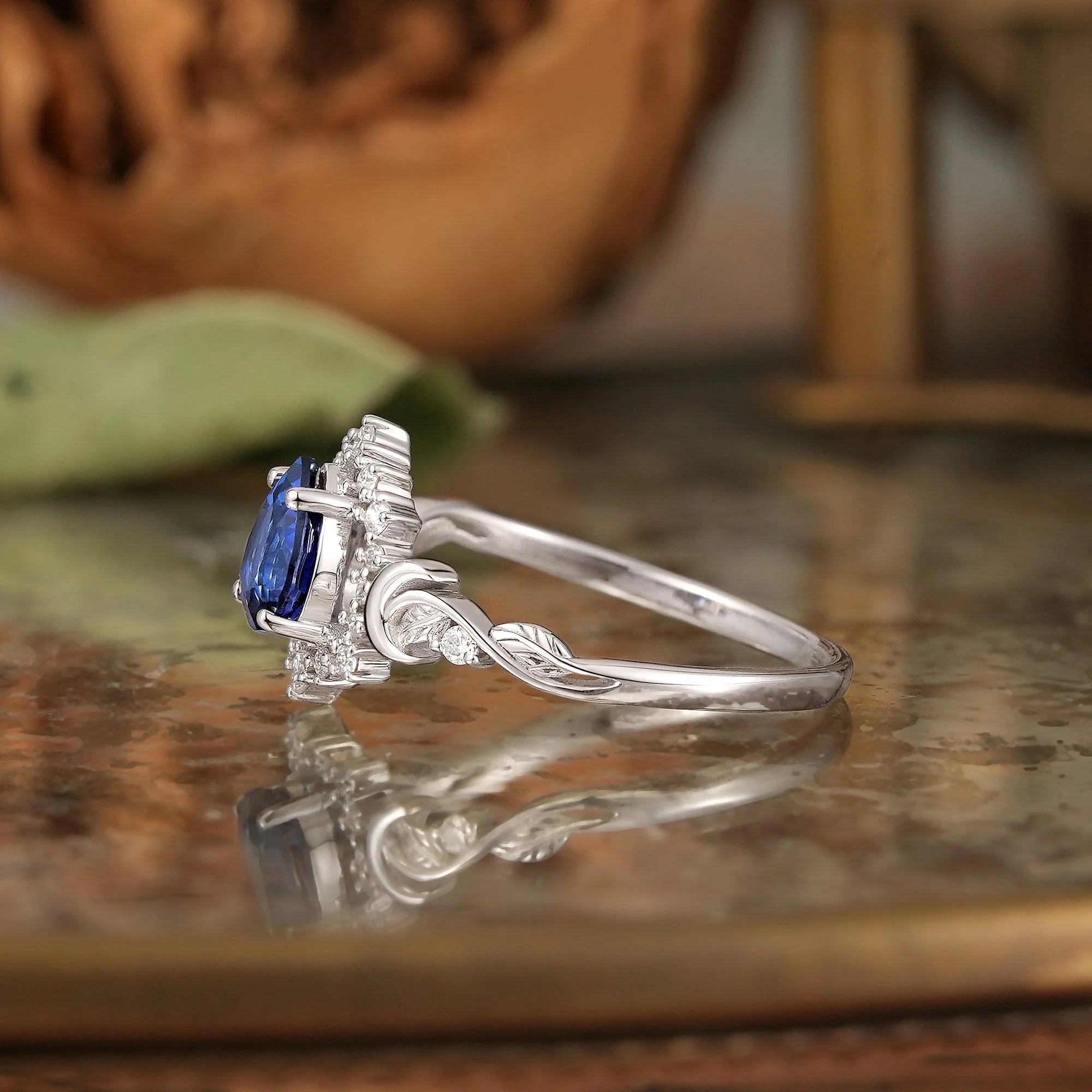 Pear Cut Royal Blue Sapphire Leaf And Moon Inspired Halo Engagement Ring - Luna | Nartya
