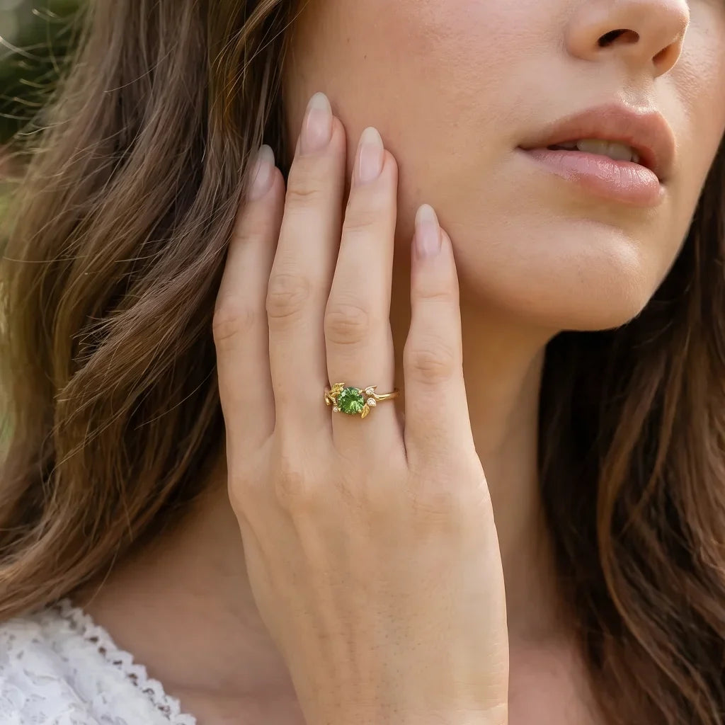 Lumière’s Verde | Round Cut Peridot Vine Engagement Ring