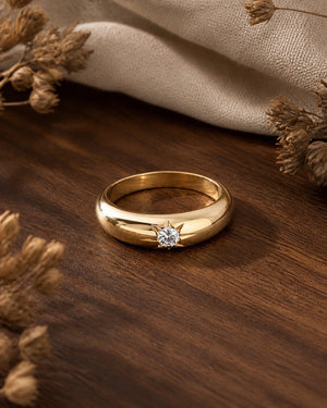 Antique Sunny Solitaire Chunky Ring on walnut tabletop