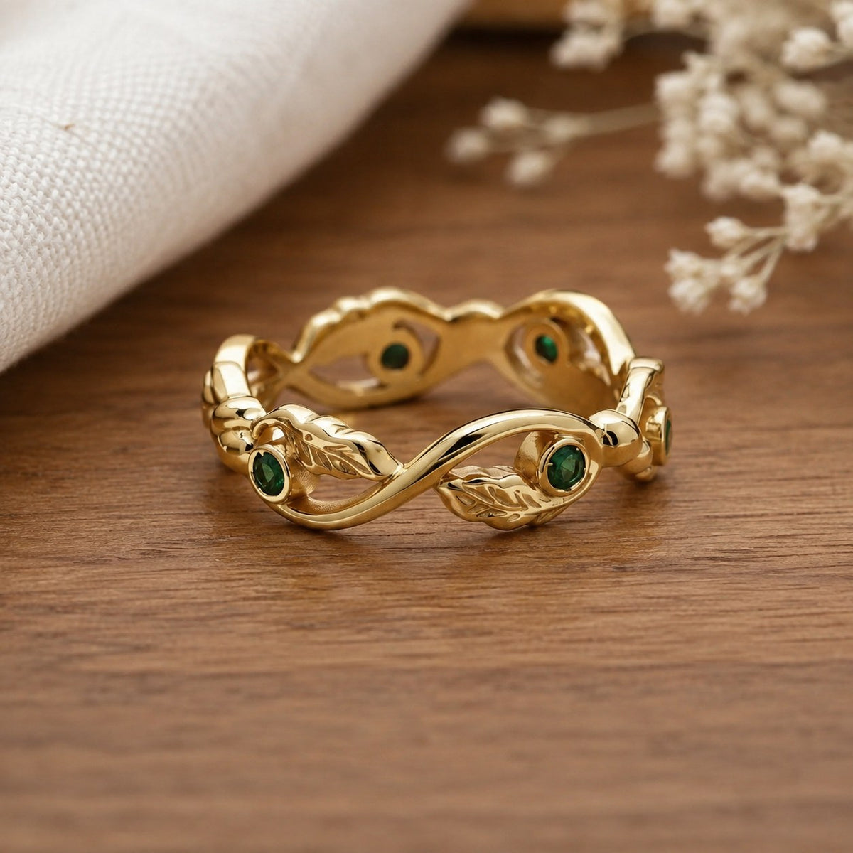 Alexandra's Heritage Art Deco Oval Blue Sapphire Vine Bridal Ring Set on warm walnut tabletop