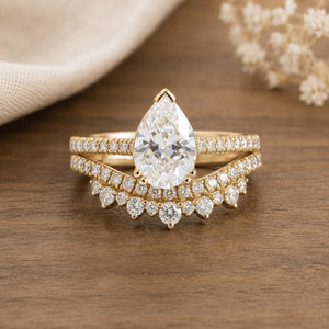 Astrid's Constellation 1ct Kite Cut Salt and Pepper Moissanite Cluster Bridal Ring Set on warm walnut tabletop