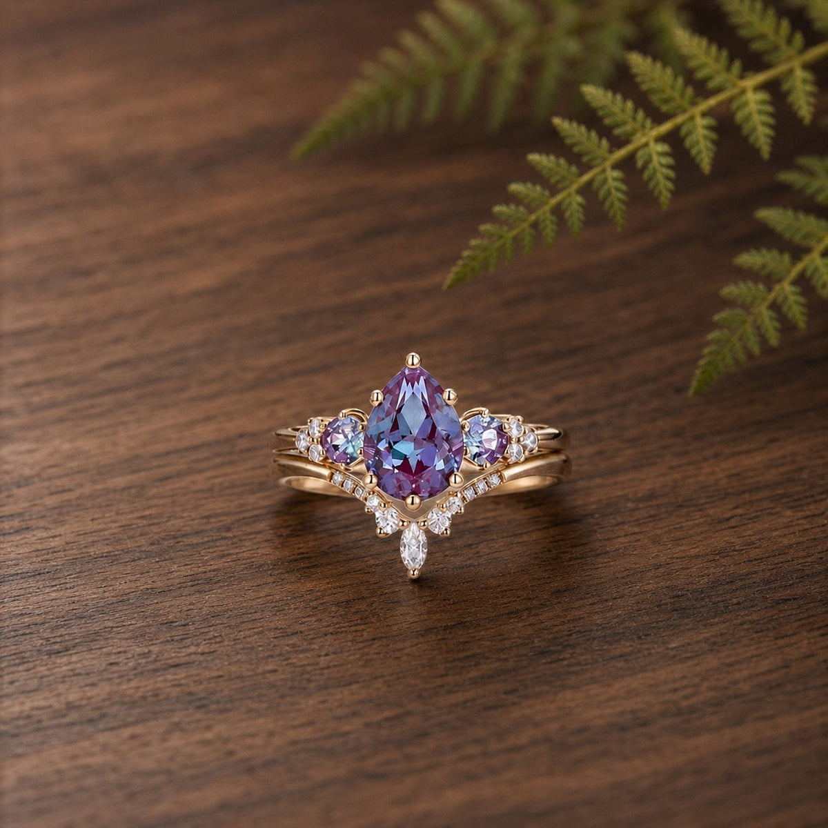 Fern Pear Shaped Alexandrite Cluster Gold Ring Set 2pcs on warm walnut