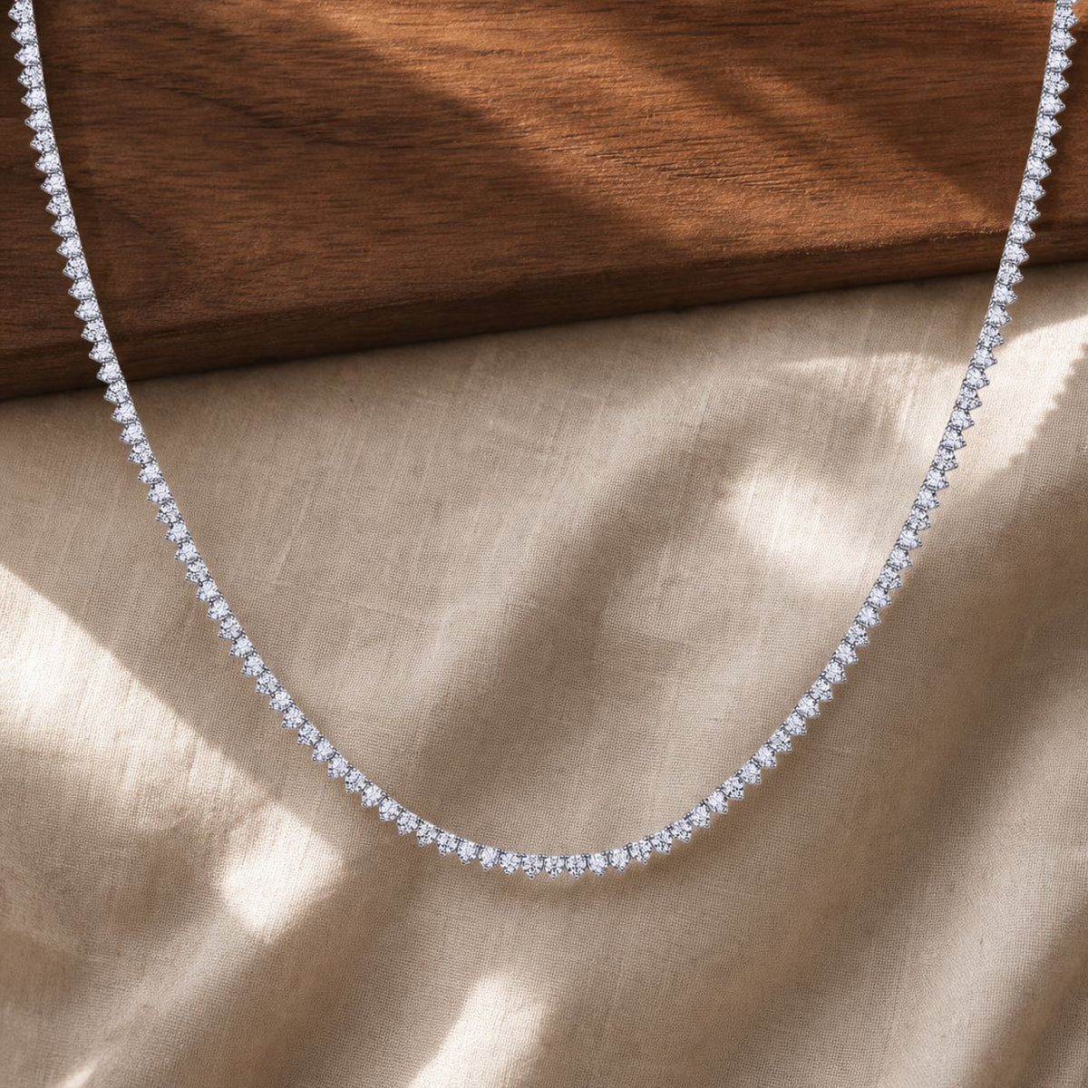 Silver moissanite dazzling snowflake pendant necklace on warm walnut