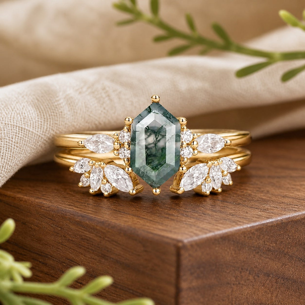 Sophia’s Serenity hexagon moss agate bridal set on a natural walnut tabletop