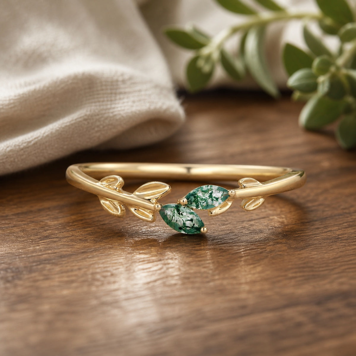 Celandine's Sprig marquise-cut moss agate leafy engagement ring