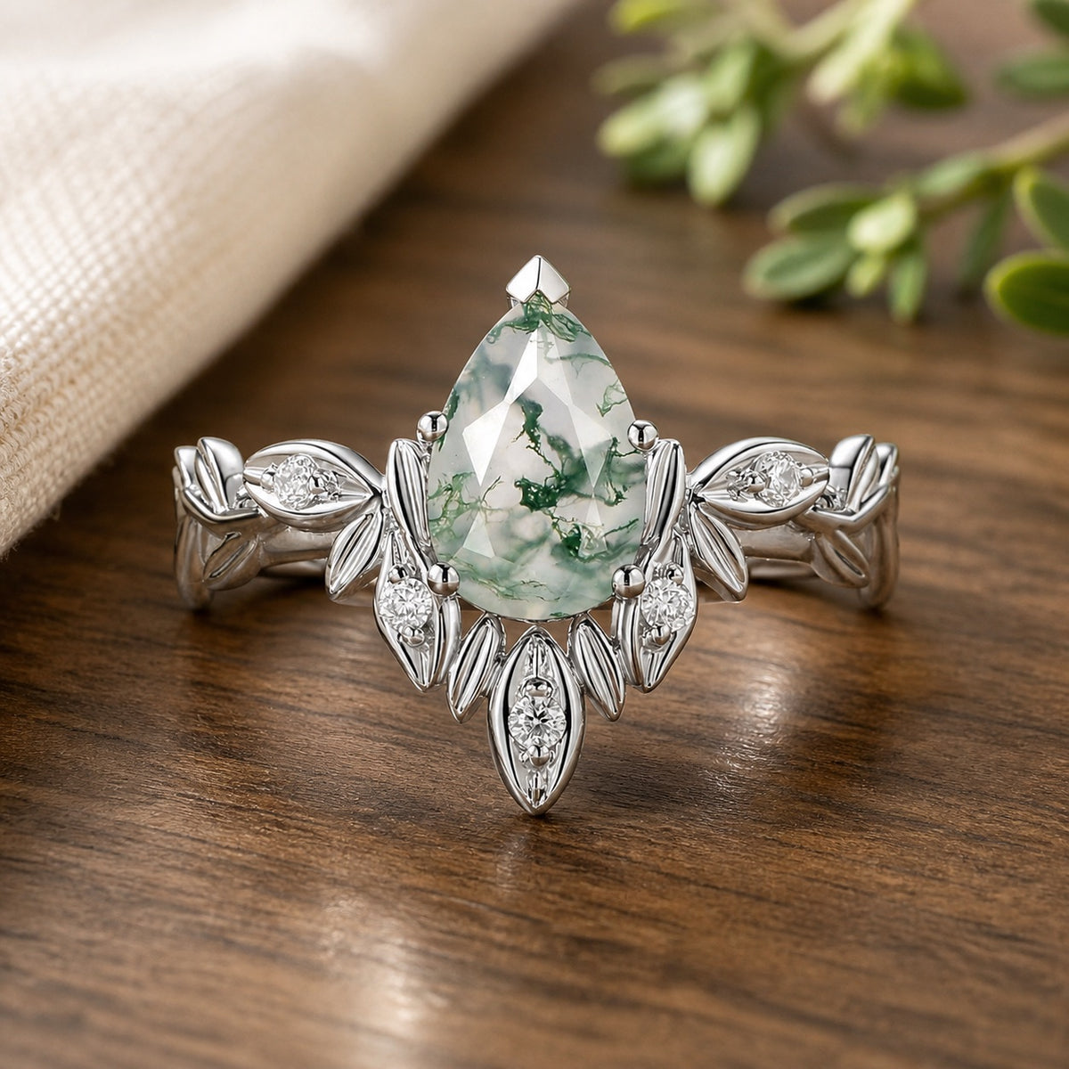 Calista's Frond pear-cut moss agate leafy engagement ring