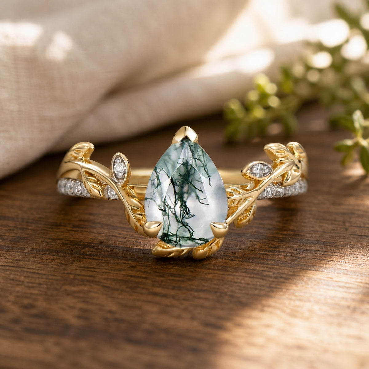 Eleanor's Vine vintage pear-cut moss agate leafy engagement ring