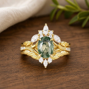 Nature Inspired oval-cut moss agate cluster leafy bridal set on a natural walnut tabletop