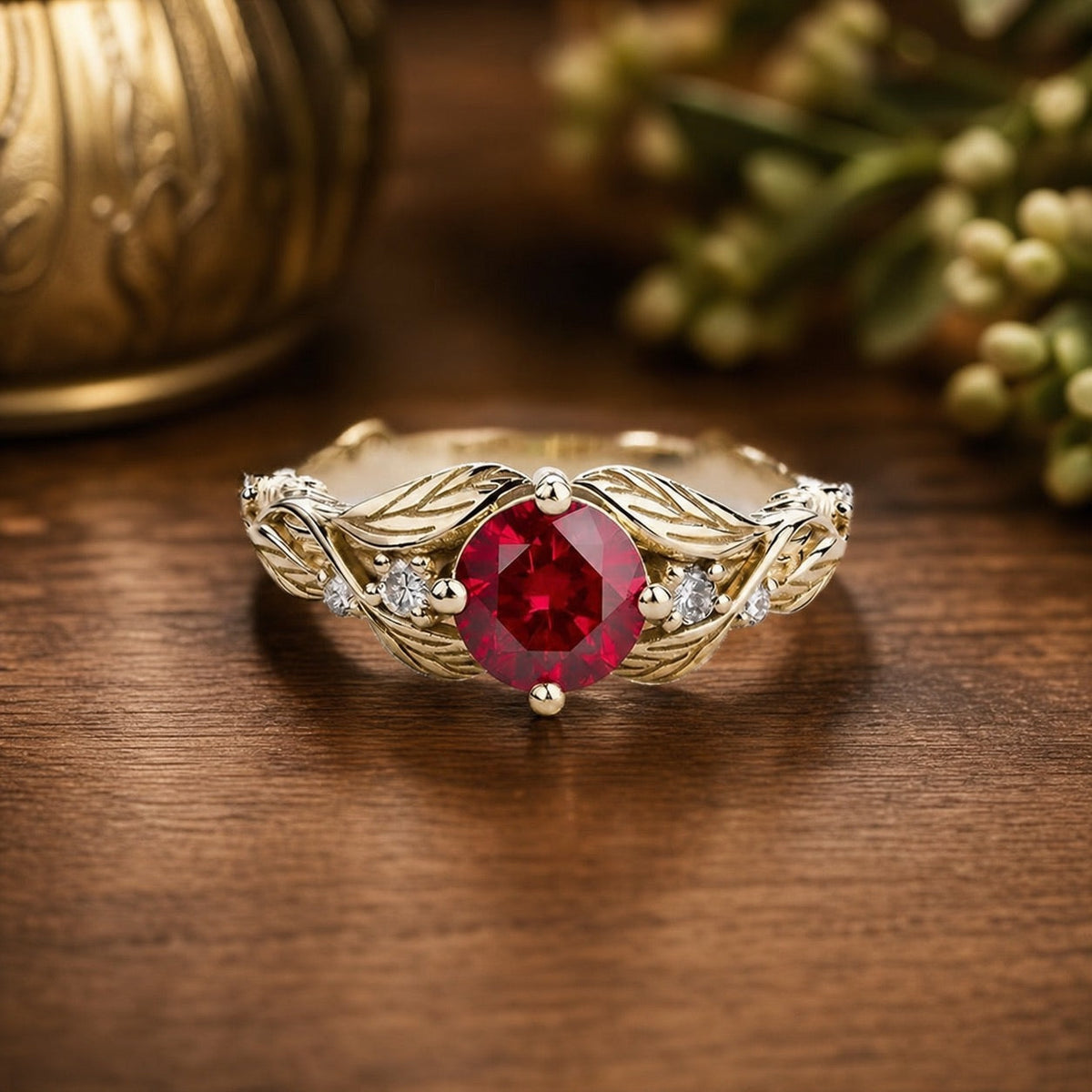 Rosalind’s Olive | Round Ruby Solitaire Ring with Olive Leaf Diamond Accents – front view on warm walnut background