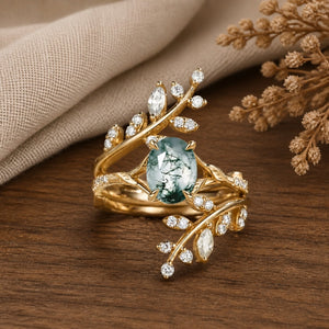 Daphne's Wreath Oval Moss Agate Cluster Enhancer Bridal Ring Set on walnut tabletop
