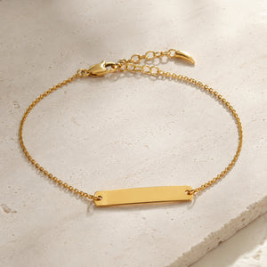 Gold vermeil engravable bar chain bracelet on pale stone